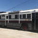 Image for article titled This Wild School Bus RV Has Underglow And A Fire Pit On Its Roof
